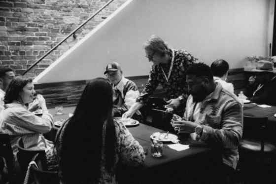 a toast at a community dinner
